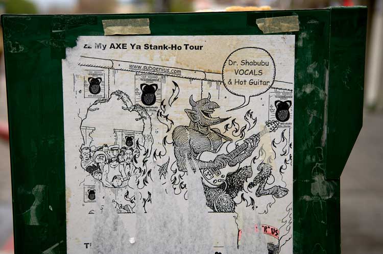 A sidewalk newspaper dispenser in Oakland.