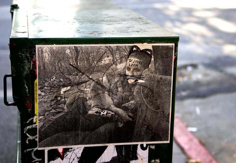 A poster on a news box in downtown Oakland
